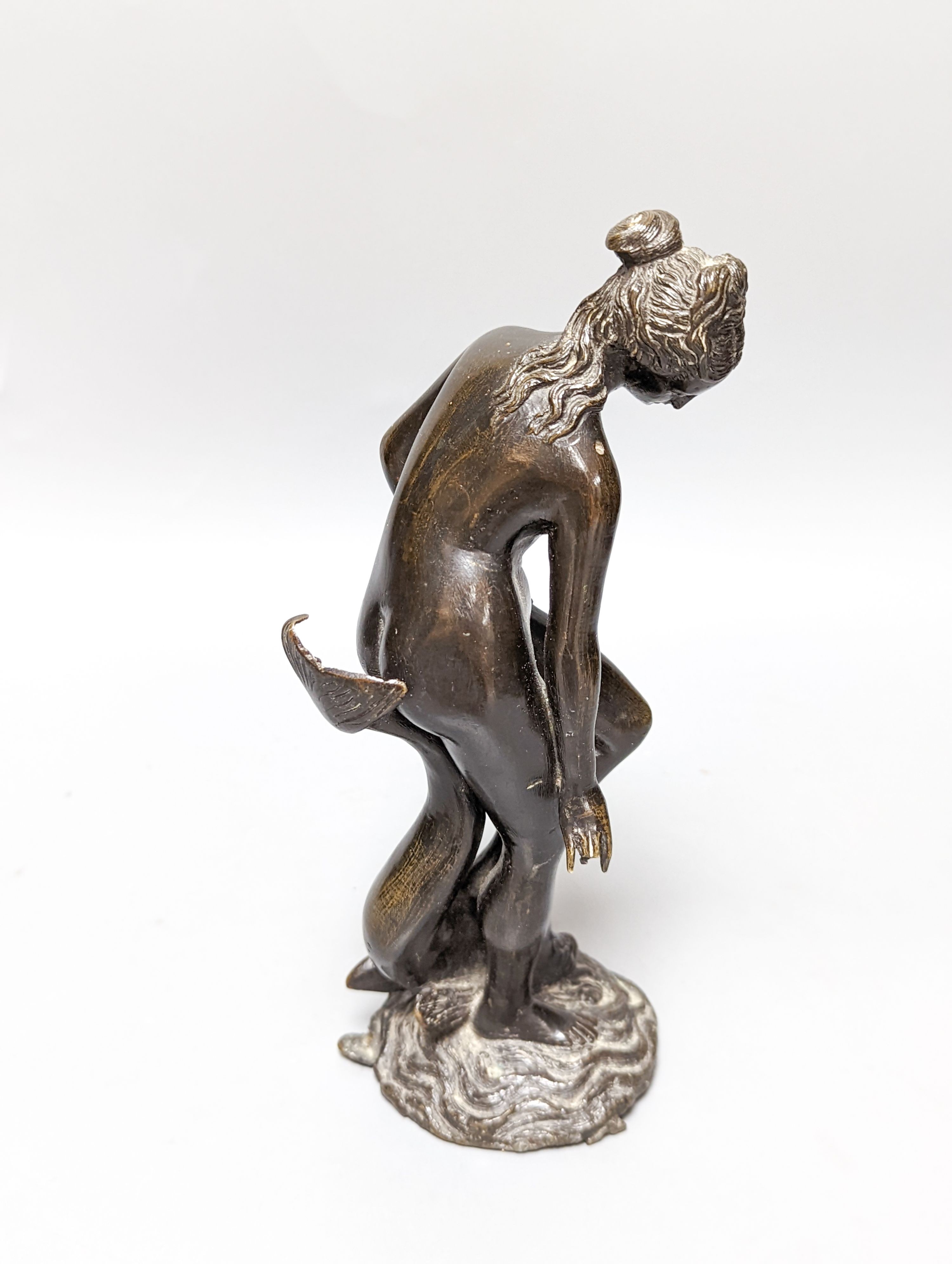 A WMF pewter teapot, an early 20th century bronze of Venus with dolphin, 2 other figures and a WMF style figural desk stand 36cm